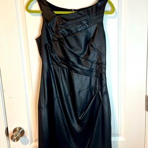 Unique Vince Camuto black dress with a shine that makes it look like leather